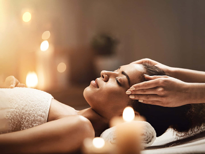 Lady receiving a facial treatment in spa